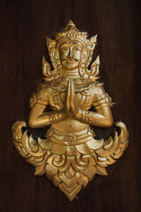 Fototapeta na wymiar Buddhism Religion Golden Temple Image Sough-East Asian Praying Statue