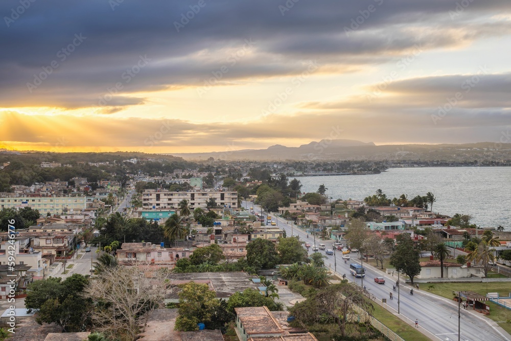 Canvas Prints Aerial shot of the India Dormida mountains and Matanzas city in Cuba under the sunset sky