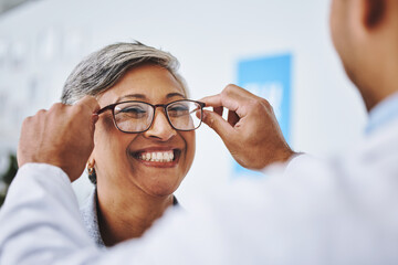 Optometry, smile and woman with prescription glasses, optician and helping client with product....