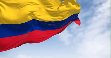 Colombia national flag waving in the wind on a clear day