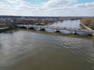 Putney Bridge London UK drone aerial view over luxury riverside apartment