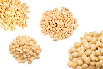 Macadamia nuts isolated on white background.