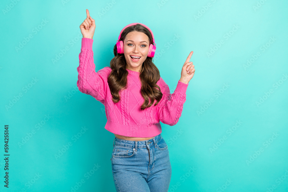 Poster portrait of overjoyed crazy lady wear trendy pink clothes celebrate sale discount modern mp3 player 