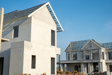 New Building site housing estate development construction residential new house in progress residential estate