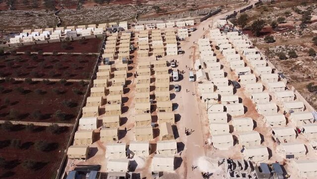 Drone shot of hundreds of tents inhabited by Syrian refugees for years due to the war that destroyed their homes.
