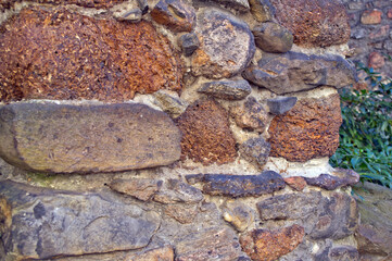 Old wall covered with stones