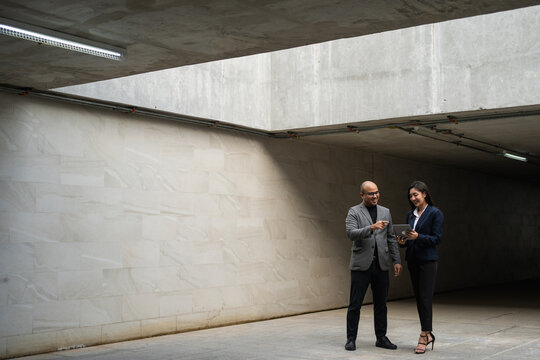 Asian business people team analyzing statistics financial. Team of businesspeople man and woman Meeting Conference Discussion Corporate Concept in office.