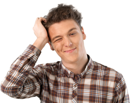 Young man scratching his head