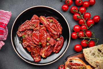 sun dried tomato vegetable appetizer healthy meal food snack on the table copy space food background rustic top view keto or paleo diet veggie vegan or vegetarian food