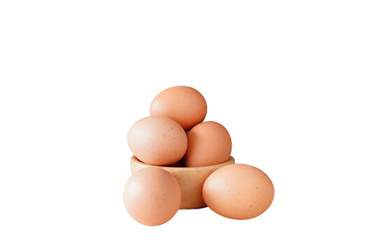 Raw chicken eggs, close-up (blurred or blurry)