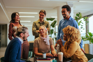 Cheerful businesspeople informal meeting.