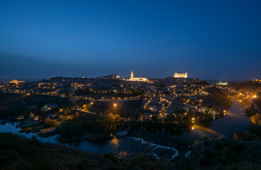 Toledo, Spain - April 9, 2023: Panoramic view of the city of Toledo at night