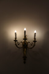 Old Vintage Styled Three Wall Candles with Modern Electricity Supplied Power