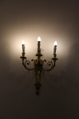 Old Vintage Styled Three Wall Candles with Modern Electricity Supplied Power