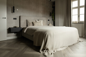 Grey sleeping Bedroom with pillows 