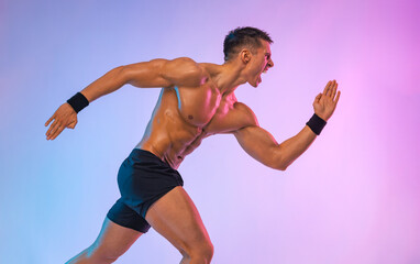 Runner concept. Athlete sprinter running on blue background. Fitness and sport motivation. Trail...