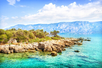 Rocky coast of the island on the way to Cleopatra island, Aegean sea, Marmaris, Turkey