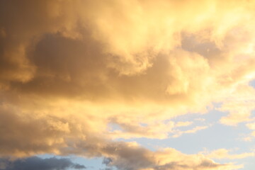 Fototapeta na wymiar A Bright Orange Yellow Sky around Sunset Time