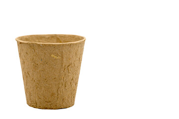 Brown garden pulp seedling pots, Disposable garden pots, Transporting plants  isolated on white...