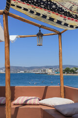 street pretty outdoor cafe with the beautiful view on the sea
