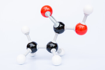 Propanoic acid molecular structure isolated on white background. Chemical formula is C3H6O2., Chemistry molecule model for education on white background
