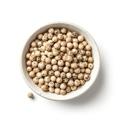 White pepper in white bowl isolated on white background. Top view. Ingredient, recipe, seasoning.