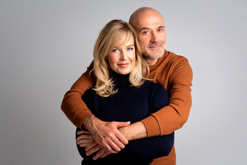 Smiling couple against white background