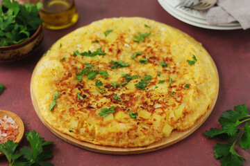 Frittata, traditional egg and potato omelette, Italian dish