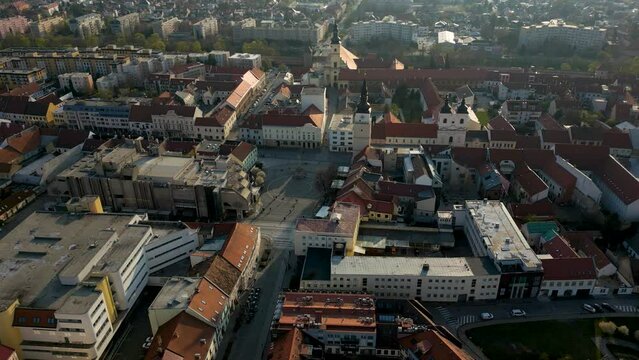 Aerial view of the streets of Trnava, beautiful sunny evening, Slovakia, 4k