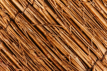 Rustic wooden background featuring a textured surface with straws, perfect for wallpapers
