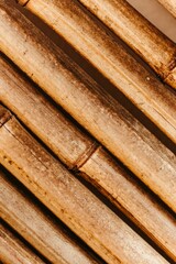 old bamboo sticks are arranged together and stacked on a counter top