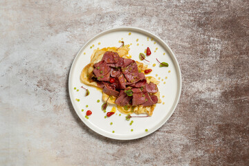 Homemade pancakes with pastrami