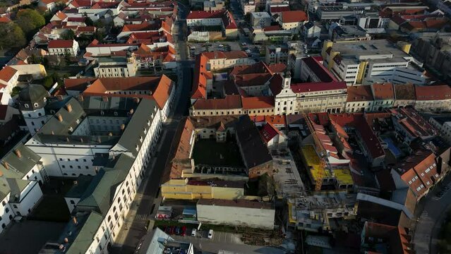 Drone is flying over Trnava, streets of a small town, football stadium, 4k