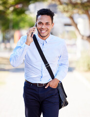 Emails get reactions. Phone calls start conversations. a young businessman using his phone outside in the city.