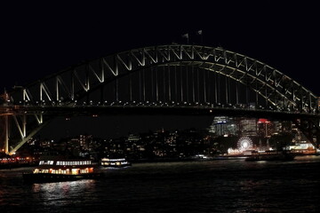 Sydney Harbour Bridge-arch and pylons-viewed from the Opera House at night under floodlight. NSW-Australia-589