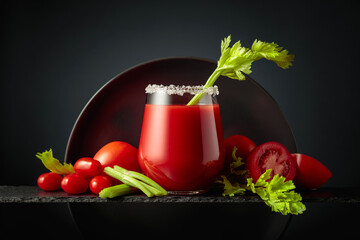 Fresh tomato juice or cocktail Bloody Mary with celery.
