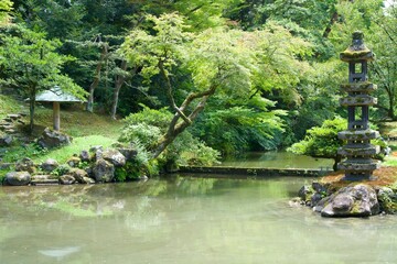 Fototapeta na wymiar The scene of beautiful Japanese Garden at Kenroku-en