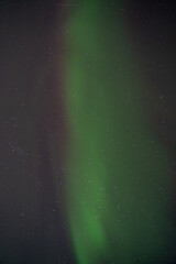 Northern lights in lapland on a frozen lake