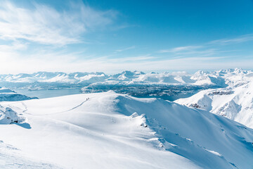 Ski alpinist looking the view on the Lyngen Alps, Norway 