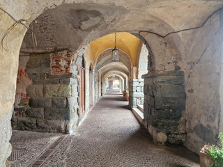 narrow streets of noli medieval village liguria italy - obrazy, fototapety, plakaty