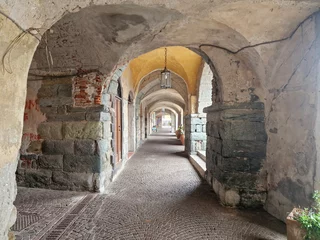 Fototapete Rund narrow streets of noli medieval village liguria italy © Andrea Izzotti