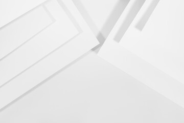 White abstract background in modern geometric urban simple style with stripes, angles in hard light with shadow, top view, copy space, border, backdrop for advertising, design, card, poster, text.