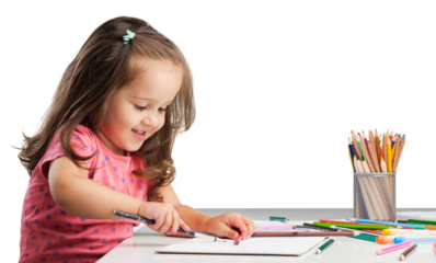 Cute little girl doing homework,writing and painting.