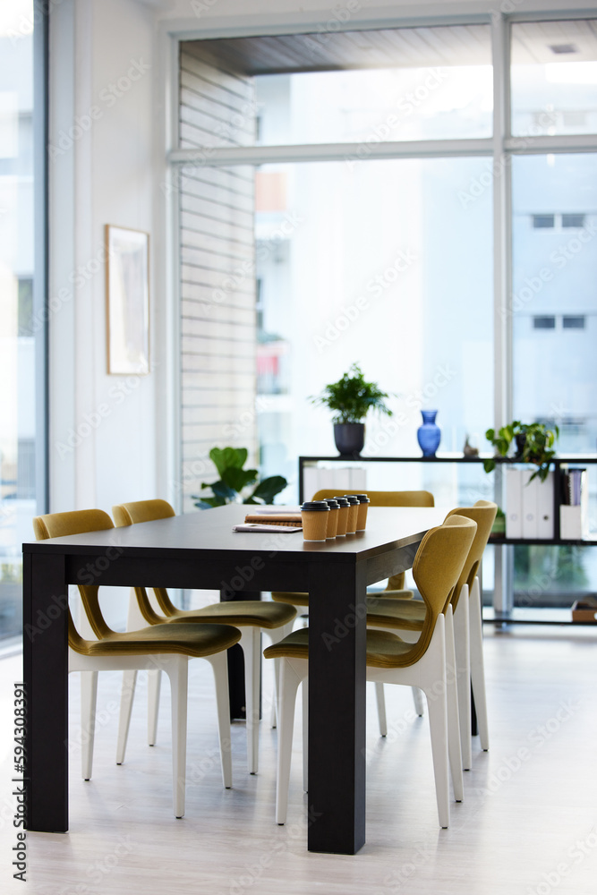 Poster brilliant ideas are discovered in here. coffee and paperwork on a desk in an empty office during the