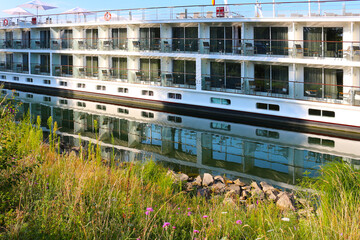 Close up of river cruise liner with balconies, river Rhine, Breisach, South Germany - 594308788