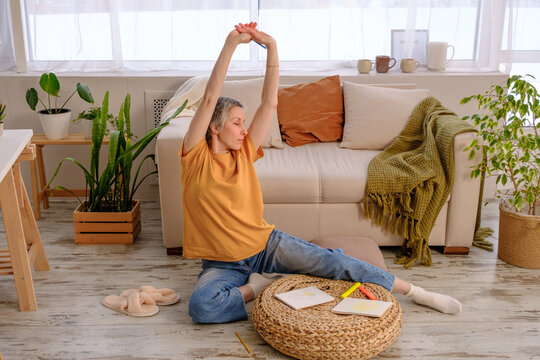 Adult woman meditating and enjoying life after surviving cancer