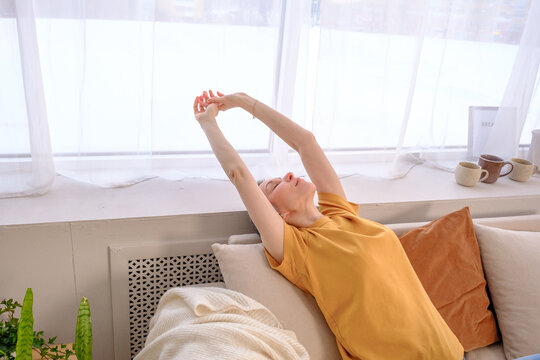 Calm adult woman after chemo resting at home