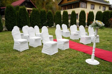 Alley with a red carpet for a wedding ceremony