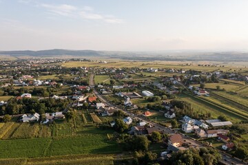 Aerial landscape over a village with lands