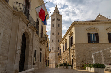 Fototapeta na wymiar TRANI, ITALY, JULY, 8, 2022 - The tower bell of the Basilica Cathedral of the Blessed Virgin Mary of the Assumption in Trani, Apulia, Italy